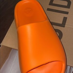 Authentic orange yezzy slides size 6 men